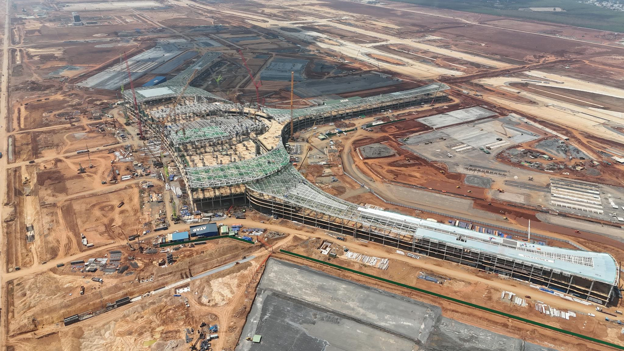 Aerial view of a large construction site in Đồng Nai, Vietnam, showcasing modern architecture.